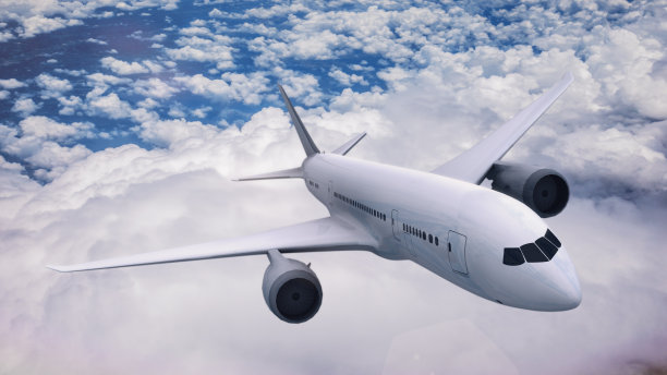 商业飞机在云层上飞行图片下载