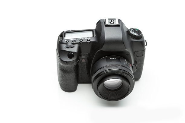 数码相机，50mm镜头，白色背景图片下载