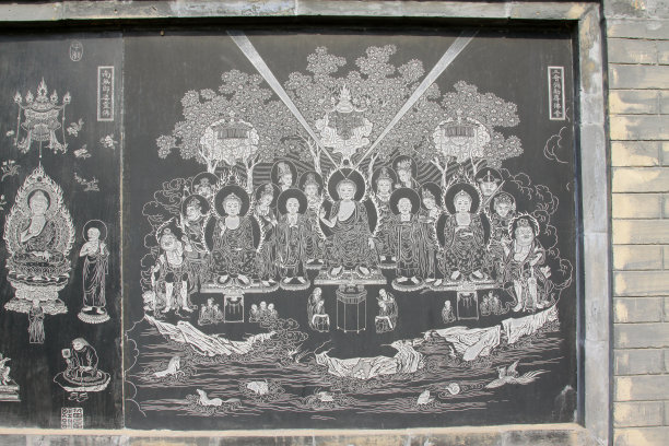 中国河北省于田县极乐寺黑色大理石上的精美雕像素材图片