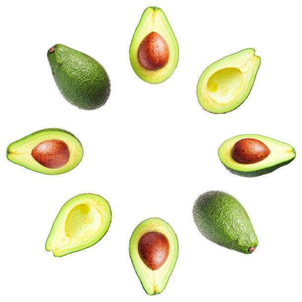 几个鳄梨完整和切割，有种子和没有躺在一个圆圈孤立在白色的背景，剪贴艺术图片下载