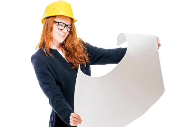 年轻成功的女老板戴着黄色头盔，带着孤立的蓝图图片下载