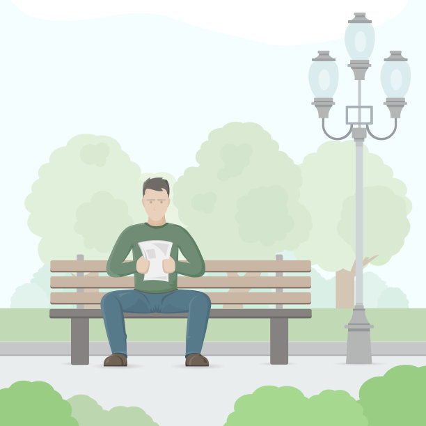 一个年轻人坐在长凳上看报纸。图片下载