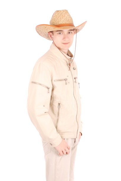 一个戴牛仔帽的男孩的肖像图片下载