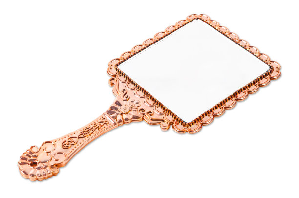 粉金色手镜孤立在白色图片下载