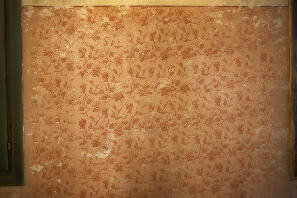 老墙。复古。棕色的背景。花的纹理。图片下载