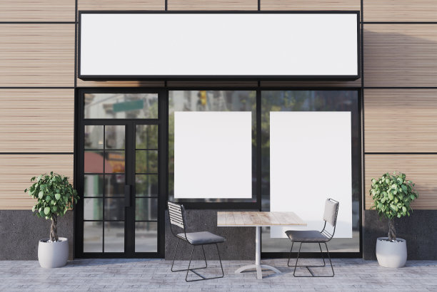 米色的咖啡馆外观，前面有两张海报图片下载