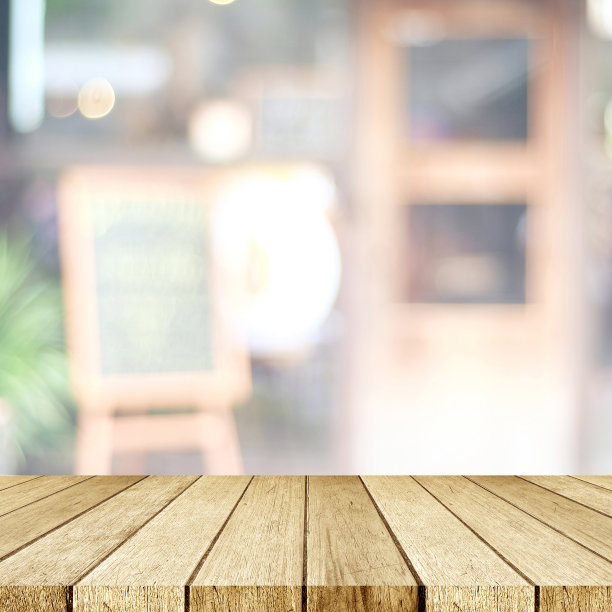 空透视木材，桌面，过模糊餐厅与散景光背景，食物和产品显示蒙太奇背景图片下载