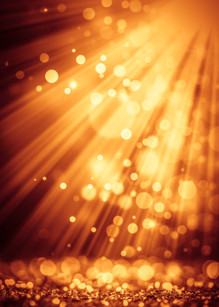 金色光束散焦的火花图片下载