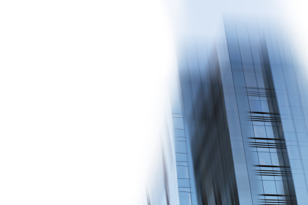 摘要商业现代城市城市未来建筑背景。房地产概念，动态模糊，高层摩天楼立面的玻璃反射，色调蓝色的画面与散景图片下载
