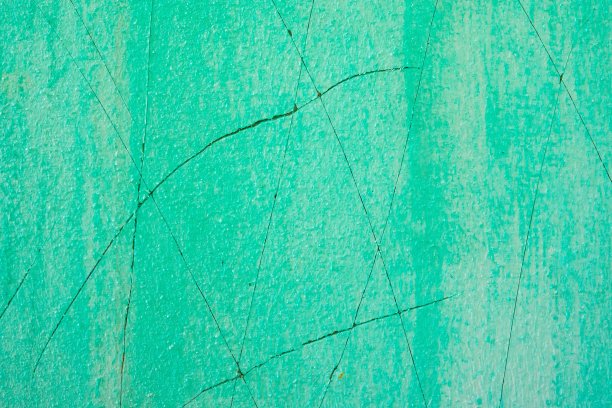 硬化水泥凹凸不平的墙面表面纹理出现裂缝图片下载