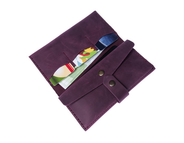 女人的钱包，里面有手机，钱和信用卡。图片下载