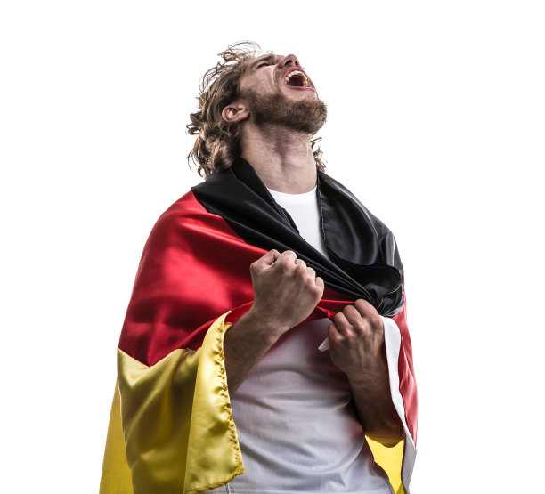 德国男运动员/粉丝在白色背景下庆祝图片下载