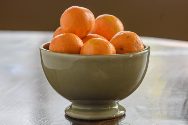 绿碗的桔子图片下载