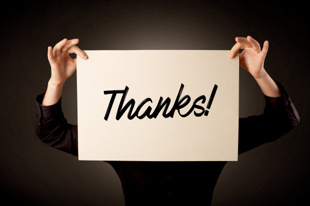 商人拿着纸表示感谢素材图片