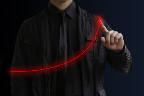 商人用手指画箭头。代表业务增长图片下载