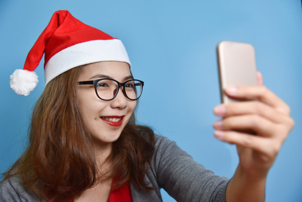 亚洲女性微笑和自拍照片。图片下载