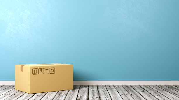 木质地板上的单一封闭硬纸盒图片下载