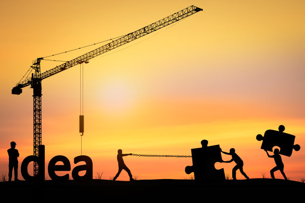 剪影的男人帮助推和拉拼图，概念作为团队和团队图片下载