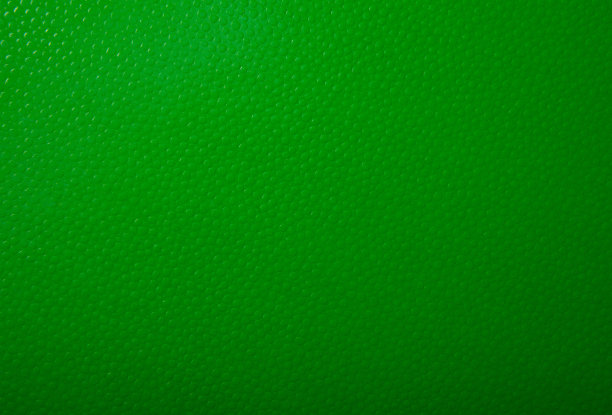 绿色纸的纹理作背景。带有凸球的纹理图片下载