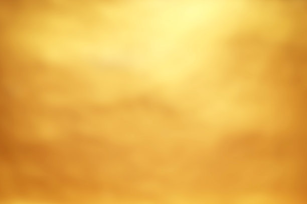 金色墙壁模糊的背景。素材图片