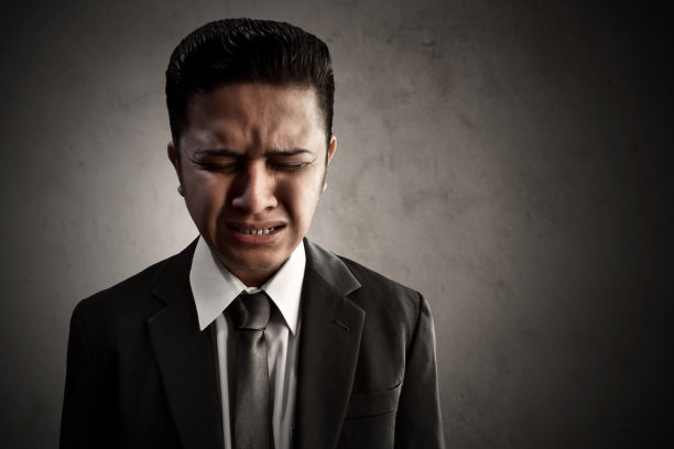 商人悲伤图片下载