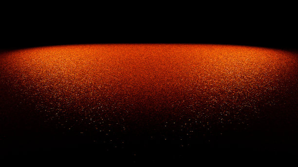 节日闪光背景-闪光在金色，橙色和红色的阴影在两个聚光灯照亮的平面上图片下载