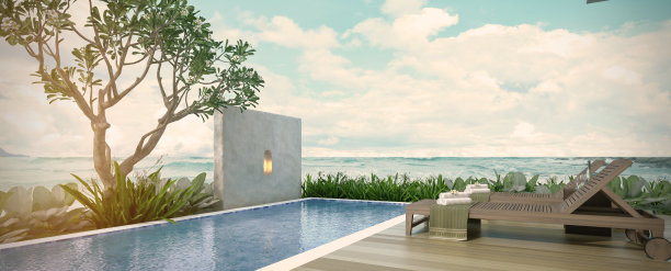 海景游泳池在现代阁楼设计，豪华的海洋海滩房子素材图片