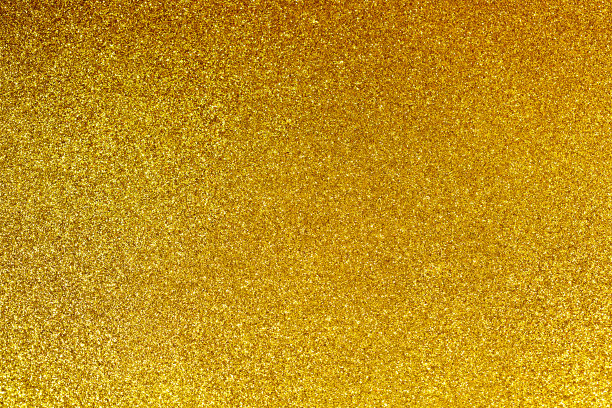 抽象背景充满了闪亮的金色闪光图片下载