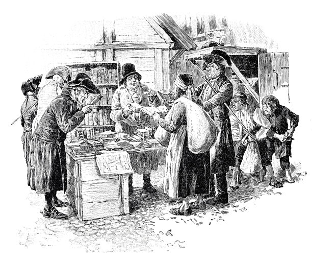 在莱比锡集市上:参观藏有古籍的摊位的人们图片下载