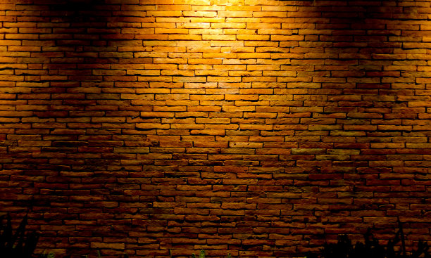 带有光线的砖墙作为抽象背景图片下载