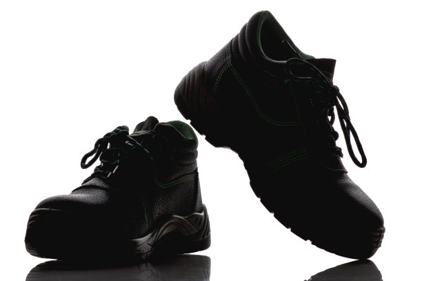 防护靴剪影，鞋底牢固的特殊防护鞋，时尚安全的概念图片下载