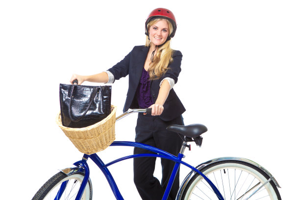 年轻的职业妇女骑自行车上班图片下载