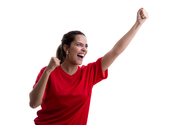 身穿红色制服的女运动员/粉丝在白色背景下庆祝图片下载