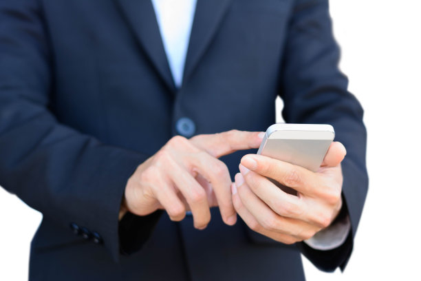 商业概念与男人拿着智能手机在白色的背景图片下载