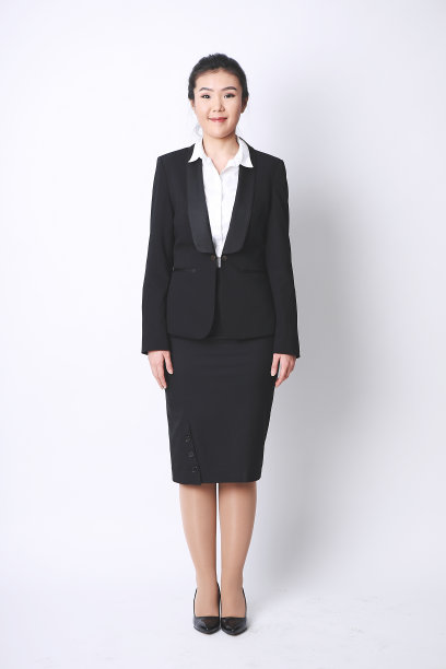 年轻的女商人站在白色的背景上图片下载