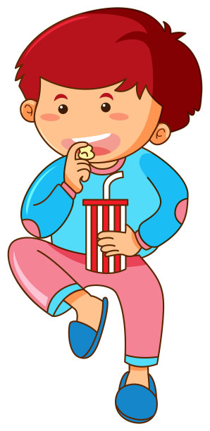 小男孩吃着爆米花，喝着苏打水图片下载
