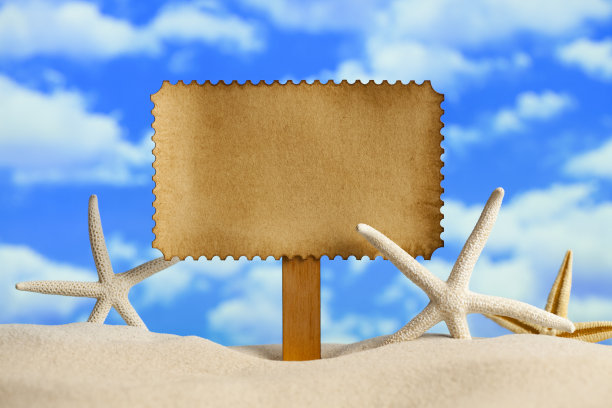 夏季背景-空白纸和海星在海滩上图片下载