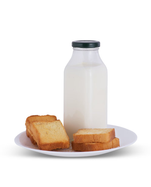 面包和牛奶在白色的背景图片下载