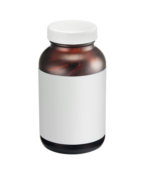 白色背景上的棕色玻璃药瓶图片下载