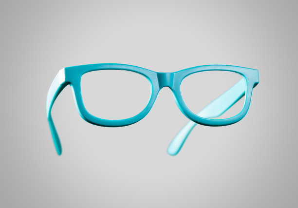 绿松石眼镜在灰色背景图片下载