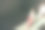 高角度的美丽的年轻女子在时尚的粉红色衣服走在工作室图片下载
