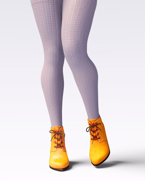 美丽的女性腿羊毛紧身裤和半珠。图片下载