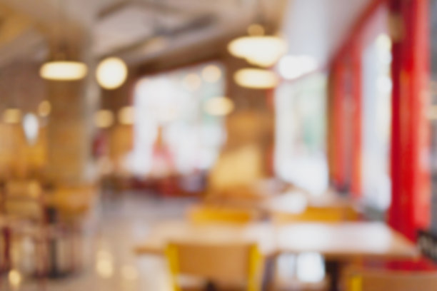 抽象模糊和散焦餐厅内部，咖啡馆或咖啡馆的背景与散焦灯光图片下载