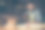 近距离的照片自信英俊的胡子熟练穿着围裙格子衬衫和保护眼镜木匠，他正在用一个锯子把木板分成两部分图片下载
