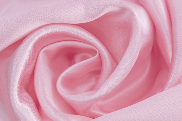 抽象的背景奢华的粉红色褶皱与波浪，波浪褶皱为背景纹理，背景图像以甜美，诱人的风格。图片下载