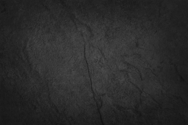 深灰色黑色石板纹理在自然的模式与高分辨率的背景和设计艺术作品。黑色的石墙。图片下载