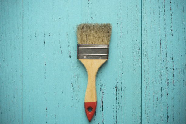 油漆刷在破旧的木头背景上图片下载