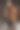 模特样的男子站在以汽车为背景的城市街道上，看他的手表和周围图片下载