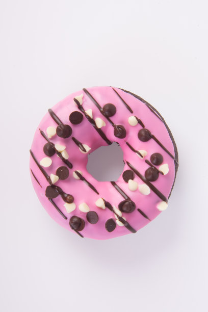 甜甜圈在背景。图片下载