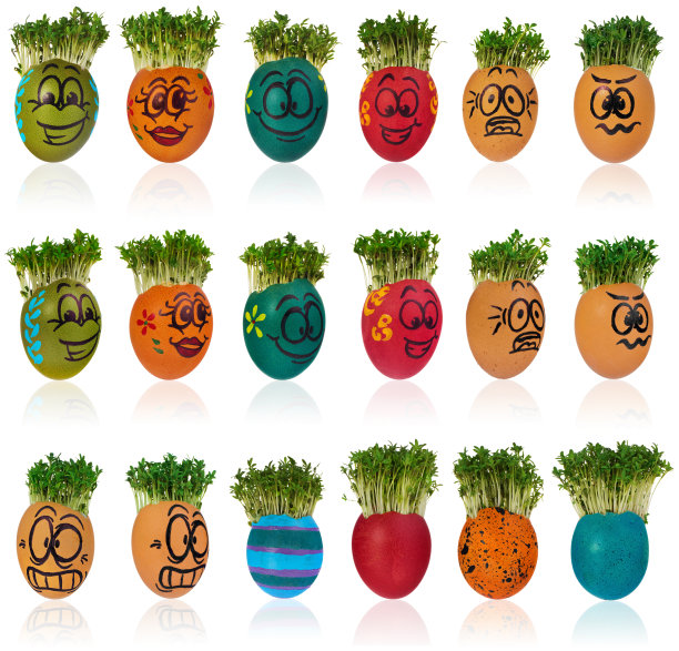 绘有滑稽笑脸女孩和彩色图案的复活节彩蛋，配有水芹菜般的头发素材图片